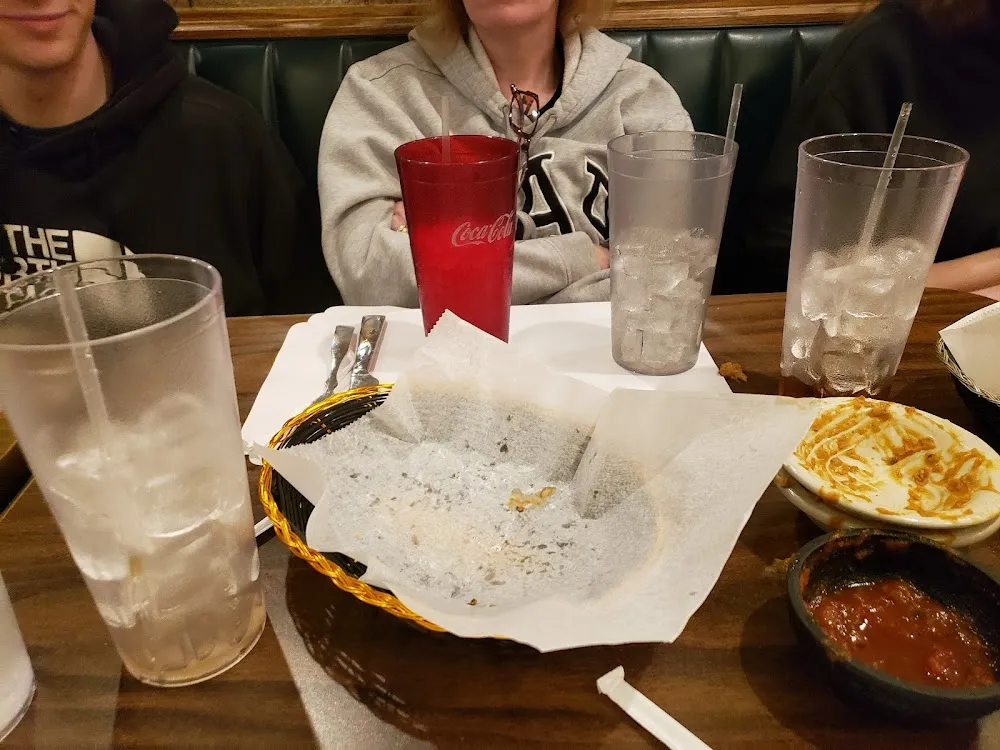 Empty Cups and Chips Because of Terrible Service